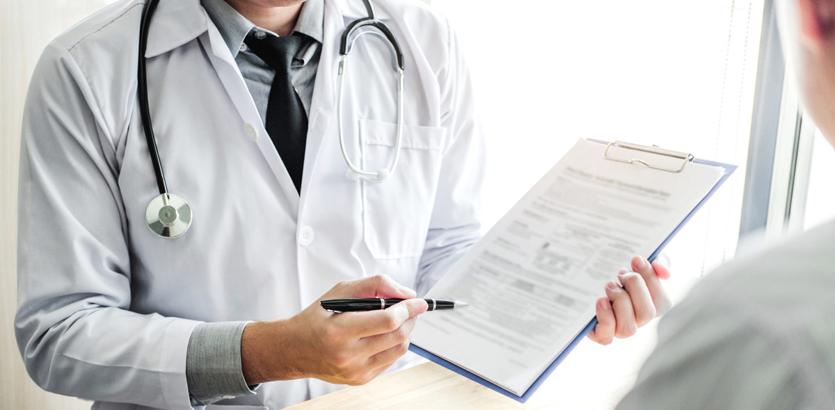 doctor holding a clipboard.